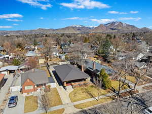 Drone / aerial view with a residential view and a mountain view