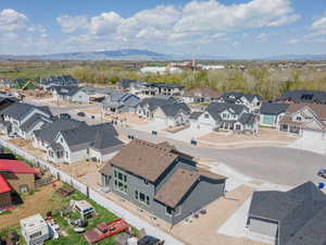 Drone / aerial view featuring a residential view and a mountain view