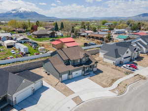 Drone / aerial view featuring a mountain view and a residential view