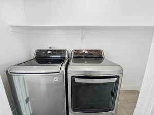 Clothes washing area with laundry area and washer and dryer