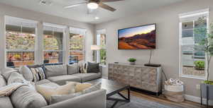 Living room with recessed lighting, wood finished floors, a ceiling fan, visible vents, and baseboards