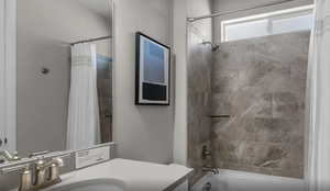 Full bath featuring shower / tub combo with curtain and vanity