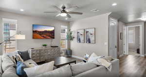 Living area featuring recessed lighting, wood finished floors, a ceiling fan, visible vents, and baseboards