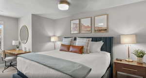 Bedroom featuring carpet floors, visible vents, and baseboards