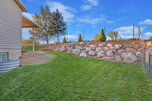 View of yard with fence