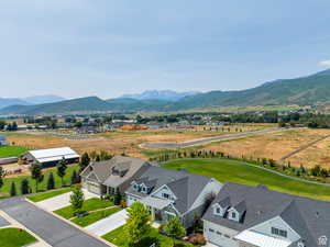 Birds eye view of property featuring a residential view and a mountain view