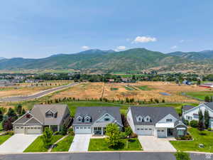 Aerial view featuring a residential view and a mountain view