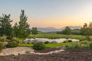 View of mountain backdrop featuring a large body of water