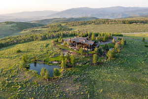 View of property location featuring a water and mountain view
