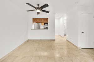 Dining area with travertine tile.