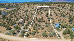 Bird's eye view featuring a mountain view and view of desert