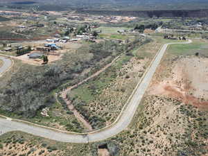 Birds eye view of property with a rural view