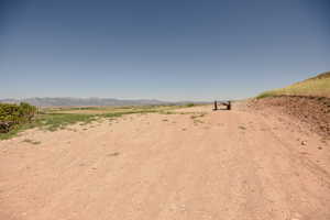 View of yard with a view of countryside and a mountain view