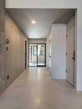 Entryway with visible vents and finished concrete flooring