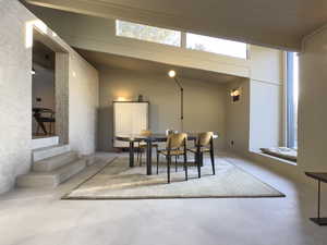 Dining room featuring finished concrete flooring