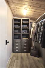 Spacious closet featuring wood finished floors