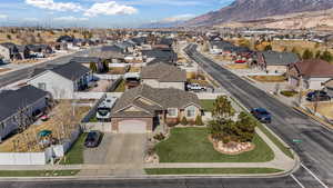 Drone / aerial view with a residential view and a mountain view