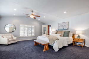 Carpeted bedroom with baseboards, ceiling fan, vaulted ceiling, a textured ceiling, and recessed lighting