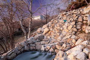 Waterfall on front/side of home