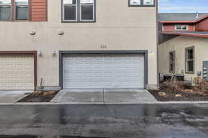 Garage with concrete driveway