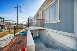 View of property exterior with board and batten siding