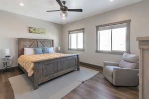 Bedroom with recessed lighting, ceiling fan, baseboards, and wood finished floors