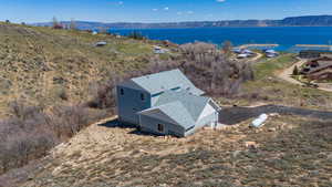 Bird's eye view with a water and mountain view