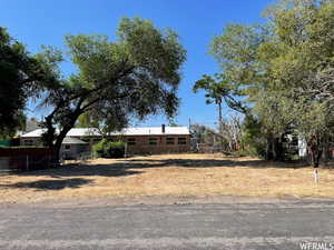 View of front facade with fence