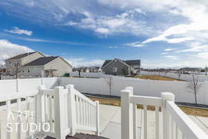 View of yard with a fenced backyard and a residential view