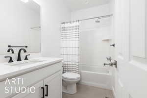 Bathroom featuring toilet, visible vents, vanity, tile patterned floors, and shower / bath combo