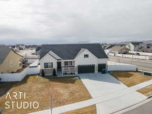 Modern farmhouse style home with a residential view, fence, a front lawn, and concrete driveway