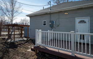 Exterior space featuring a shingled roof