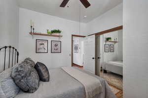 Bedroom with a closet, a ceiling fan, and wood finished floors