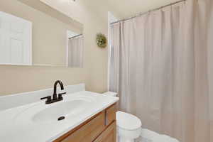 Bathroom with vanity and toilet