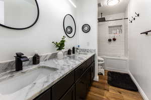 Full Bathroom with double sinks.