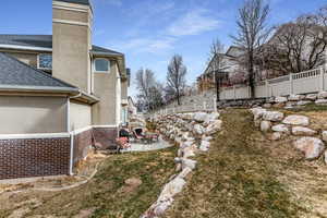 View of yard featuring a patio and a fenced backyard