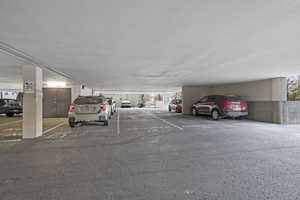 View of parking with a parking deck