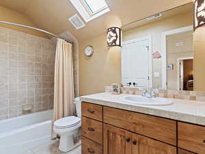 Full bath featuring tile patterned flooring, visible vents, and toilet