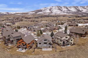 Aerial view featuring a mountain view and a residential view