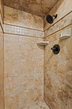 Details with a tile shower