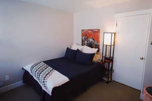 Bedroom featuring carpet flooring