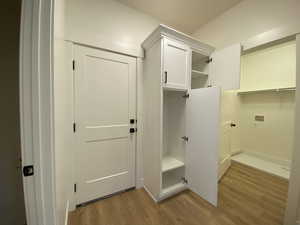 Mudroom with wood finished floors