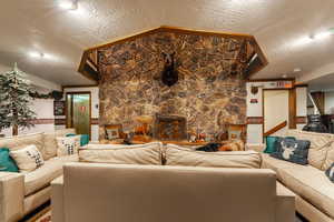 Living area featuring a textured ceiling