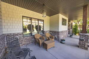 View of patio with a porch