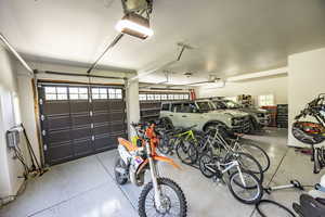 Garage with bike storage and a garage door opener