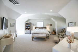 Bedroom featuring carpet, visible vents, vaulted ceiling, and recessed lighting