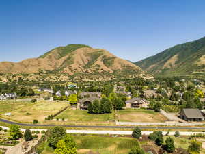 Property view of mountains featuring a residential view