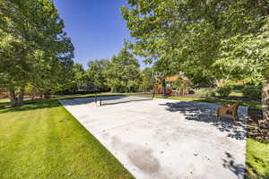 View of patio / terrace with community basketball court, playground community, and volleyball court