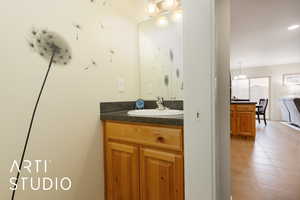 Bathroom featuring vanity and tile patterned floors