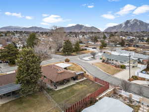 Drone / aerial view with a residential view and a mountain view